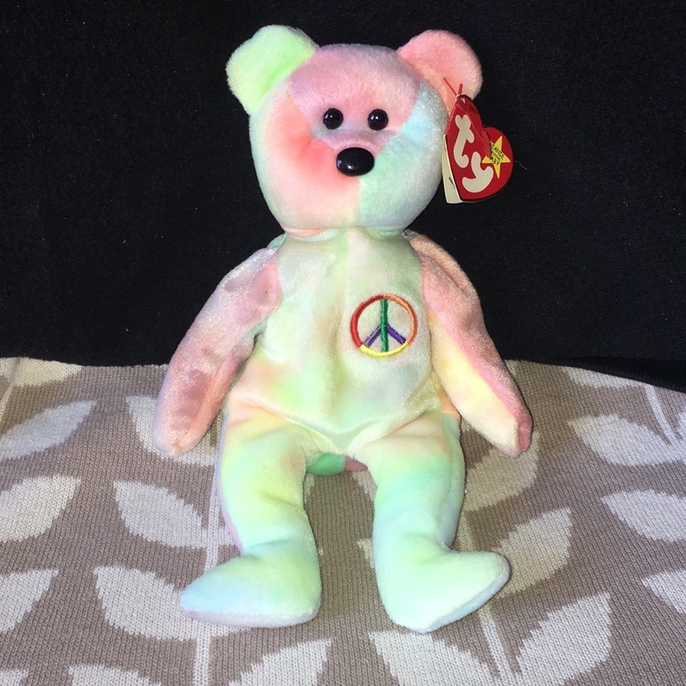 Peace bear and Paul the walrus beanie babies